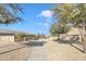 A lovely community park featuring beautiful trees, lush greenery and a gravel path at 7580 W Darrel Rd, Laveen, AZ 85339