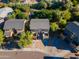 An aerial view of the neighborhood with green trees and plants surrounding the homes at 827 E Pecan Rd, Phoenix, AZ 85040