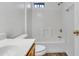 Bright bathroom with tub and wood-look flooring at 827 E Pecan Rd, Phoenix, AZ 85040