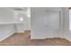 Spacious bedroom with neutral carpet, closet and plenty of natural light at 827 E Pecan Rd, Phoenix, AZ 85040