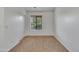 Bright bedroom with a window and beige carpet at 827 E Pecan Rd, Phoenix, AZ 85040