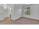 Bedroom with neutral carpet, closet and doorway access to the attached bathroom at 827 E Pecan Rd, Phoenix, AZ 85040