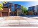 Modern townhomes with driveways and contemporary color schemes at 827 E Pecan Rd, Phoenix, AZ 85040