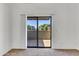 Bright living space features a large sliding glass door to private patio at 827 E Pecan Rd, Phoenix, AZ 85040