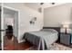 Cozy bedroom with a comfortable bed and a view into the office area at 9004 S Ash Ave, Tempe, AZ 85284