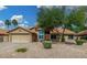 Charming single-story home with desert landscaping, a two-car garage, and a welcoming front entrance at 9004 S Ash Ave, Tempe, AZ 85284