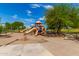 Large playground with multiple slides and play structures creating a fun and safe place for children at 9004 S Ash Ave, Tempe, AZ 85284