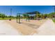 Community playground featuring swings, slides, and a shaded area, providing a fun and safe outdoor space at 9004 S Ash Ave, Tempe, AZ 85284
