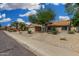 Inviting street view showcasing well-maintained homes, desert landscaping, and clear blue skies at 9004 S Ash Ave, Tempe, AZ 85284