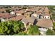 Aerial shot of neighborhood featuring mature landscaping and tile roofs at 970 S Henry Ln, Gilbert, AZ 85296