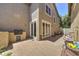 Paver patio featuring a built-in grill and outdoor seating area at 970 S Henry Ln, Gilbert, AZ 85296