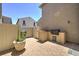 Cozy patio area featuring a built-in outdoor kitchen with a grill at 970 S Henry Ln, Gilbert, AZ 85296