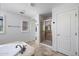 Bathroom featuring a separate shower and tub in a well-lit space at 970 S Henry Ln, Gilbert, AZ 85296