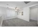 Bonus room with built in shelving, carpet, and great natural light at 970 S Henry Ln, Gilbert, AZ 85296