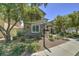 Charming two-story home boasts a stone facade, landscaped yard, and inviting curb appeal at 970 S Henry Ln, Gilbert, AZ 85296