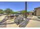 Community pool area featuring built-in BBQ, seating and shaded gazebos at 970 S Henry Ln, Gilbert, AZ 85296