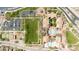 Aerial view of community amenities including pool, playground, parking, and green space at 9845 E Edgestone Dr, Scottsdale, AZ 85255