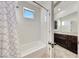 Bright bathroom featuring white subway tiles and a dark wood vanity at 9845 E Edgestone Dr, Scottsdale, AZ 85255