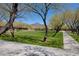 Large green space and walking path with mountain views at 9845 E Edgestone Dr, Scottsdale, AZ 85255