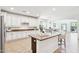 Open kitchen with an island, lots of cabinet space, stainless steel appliances, and seamless access to adjacent areas at 9845 E Edgestone Dr, Scottsdale, AZ 85255