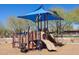 Fun playground with slides and climbing structures for children at 9845 E Edgestone Dr, Scottsdale, AZ 85255