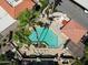 Aerial view of a community pool featuring plenty of lounge chairs and shade at 10410 N Cave Creek Rd # 2220, Phoenix, AZ 85020