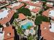 Aerial view of the community featuring a pool, jacuzzi, and palm trees at 10410 N Cave Creek Rd # 2220, Phoenix, AZ 85020
