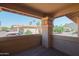 Cozy covered balcony with string lights and views of the community at 10410 N Cave Creek Rd # 2220, Phoenix, AZ 85020