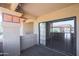 Balcony featuring wooden deck flooring and a sliding glass door to the interior at 10410 N Cave Creek Rd # 2220, Phoenix, AZ 85020