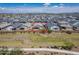 Aerial view of a single-Gathering home in a well-developed community with desert landscaping at 10509 W Harmony Ln, Peoria, AZ 85382