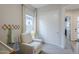 Bedroom space with crib, chair, closet and natural lighting at 10509 W Harmony Ln, Peoria, AZ 85382