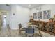 Well-lit dining area with stylish furniture and decorative accents at 10509 W Harmony Ln, Peoria, AZ 85382