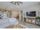 Open-concept living area with easy access to dining and kitchen, ideal for modern living at 10509 W Harmony Ln, Peoria, AZ 85382