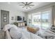Comfortable living room with large windows overlooking the backyard at 10509 W Harmony Ln, Peoria, AZ 85382