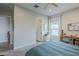 Well-lit primary bedroom showcasing stylish furnishings and inviting decor at 10509 W Harmony Ln, Peoria, AZ 85382