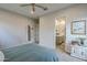 Comfortable primary bedroom with en-suite bath access, providing a private retreat at 10509 W Harmony Ln, Peoria, AZ 85382