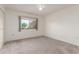 Bright bedroom with carpeted floors, a ceiling fan, and lots of space at 10724 W Cheryl Dr, Sun City, AZ 85351