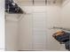 Organized closet with shelves, hanging rods, and a shoe rack at 10724 W Cheryl Dr, Sun City, AZ 85351