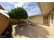 Private backyard patio with covered area, mature landscaping and room for entertaining at 10827 W Santa Fe Dr, Sun City, AZ 85351