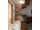 Cozy bar area with cabinetry for entertaining in a relaxing environment at 10827 W Santa Fe Dr, Sun City, AZ 85351