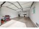 Garage featuring epoxy floors and built-in cabinets at 10827 W Santa Fe Dr, Sun City, AZ 85351