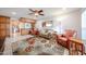 Inviting living room featuring comfortable seating and an open flow to the kitchen area at 10827 W Santa Fe Dr, Sun City, AZ 85351