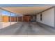 Attached carport provides covered parking and convenient access to the home at 10951 N 91St Ave # 222, Peoria, AZ 85345