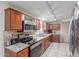 Well-appointed kitchen with stainless steel appliances and ample counter space at 10951 N 91St Ave # 222, Peoria, AZ 85345