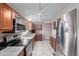 Modern kitchen with stainless steel appliances and sleek countertops at 10951 N 91St Ave # 222, Peoria, AZ 85345