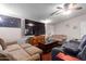 Inviting living room featuring a large TV and ample seating at 10951 N 91St Ave # 222, Peoria, AZ 85345