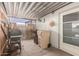 Outdoor patio with a grill, trash cans, and a door leading indoors at 10951 N 91St Ave # 222, Peoria, AZ 85345