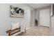 Inviting home entryway with neutral tones, tiled floors, and decorative accents at 11402 W Hadley St, Avondale, AZ 85323