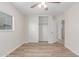 This bedroom features wood-look floors, large closet and neutral paint, ready for personalization at 11538 W Windrose Ave, El Mirage, AZ 85335