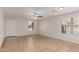 Bright, open living area features neutral paint, tile flooring, and ample natural light at 11538 W Windrose Ave, El Mirage, AZ 85335